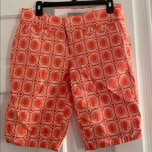 Woman’s coral Bermuda shorts